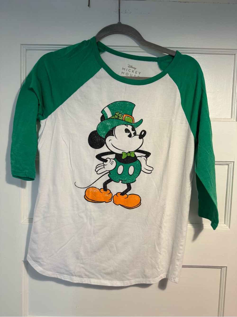 Disney White Raglan Tee with Green Sleeves & Orange Accents